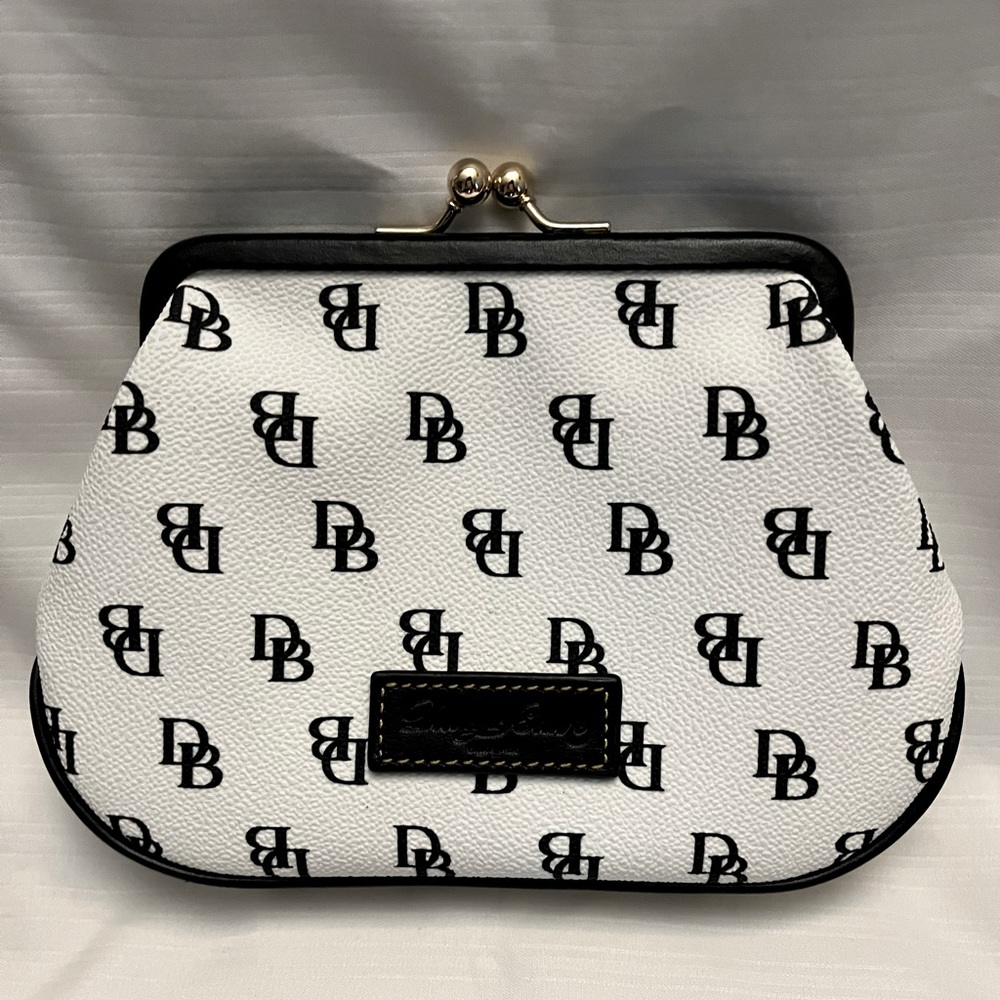 Dooney and Bourke large kiss lock wallet. Never used.